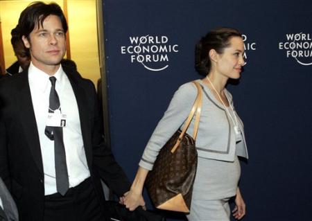Brad Pitt avec Angelina Jolie et son sac Vuitton...